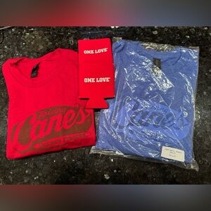 NWOT Bundle 2 Raising Cane’s Ts (1 Red, 1 Blue)/Size L/2 Can Koozies/50% Cotton